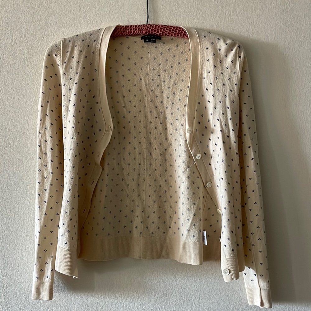 Theory button cream cardigan with black design. Theory.